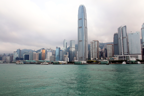 Victoria Harbor and the skyline of Hong Kong during the day.